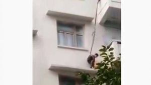 VÍDEO: Avó usa corda e pendura neto de 7 anos em sacada de prédio para salvar gato