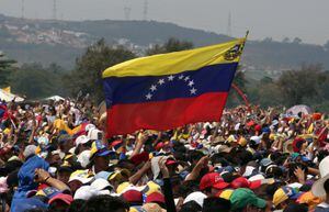 Al grito de "Sí se puede" voluntarios hacen que la guardia se retire y entren víveres a Venezuela