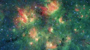 Telescópio Spitzer registra impressionante região estrelada repleta de bolhas cósmicas