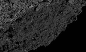 Sonda OSIRIS-REx da NASA registra 'região escura' do asteroide Bennu