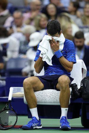 Novak Djokovic se retiró por lesión ante Stanislas Wawrinka y no podrá defender su título en el US Open