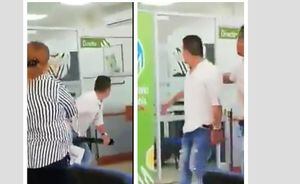 (VIDEO) Hombre casi acaba con el banco donde aparentemente trabaja su esposa y el amante