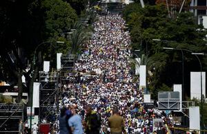 EN IMÁGENES. Manifestantes opositores y oficialistas se movilizan en Caracas