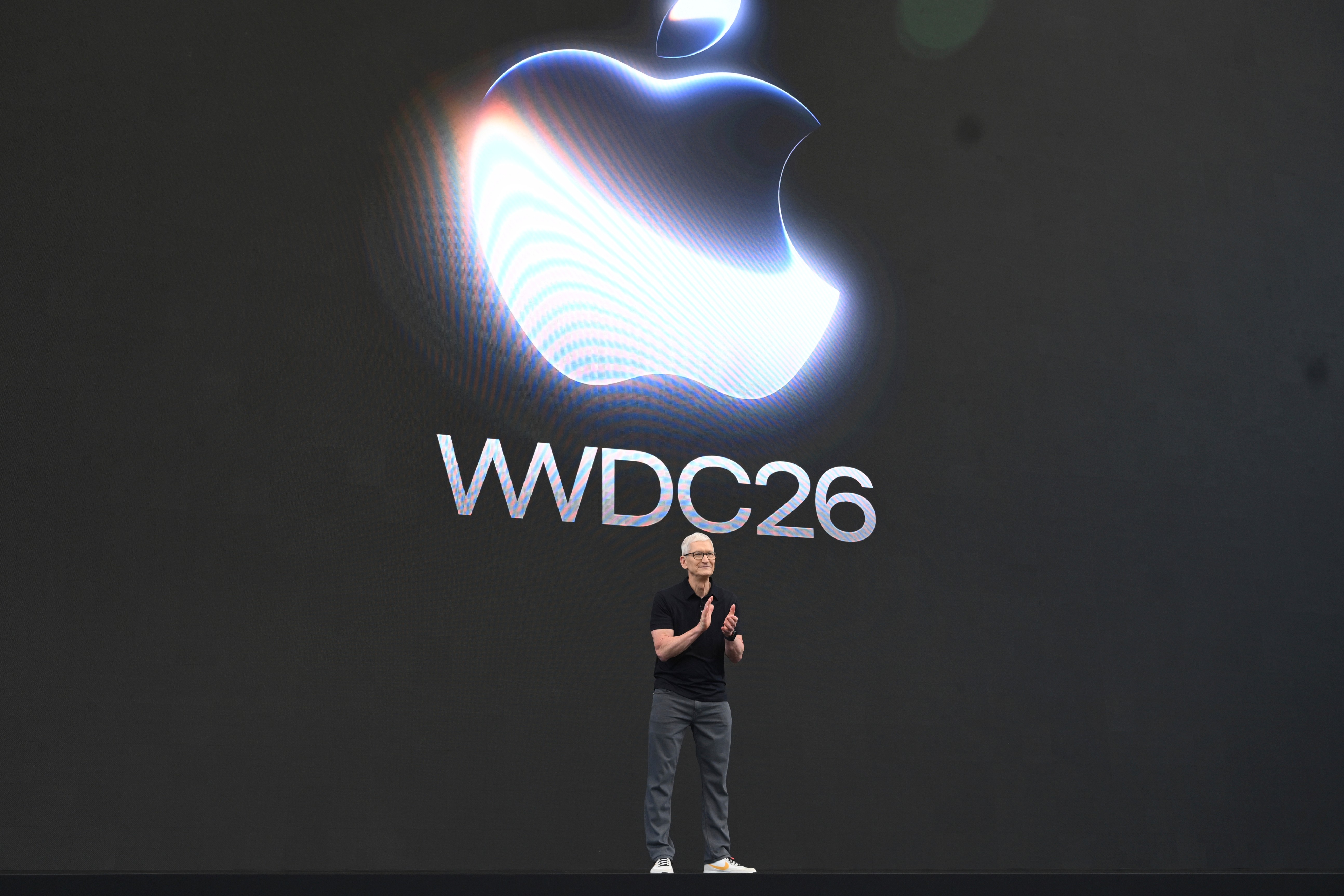 CEO Tim Cook stands on stage at the annual World Wide Developers Conference at Apple's headquarters in Cupertino, Calif
