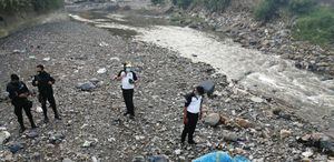 Localizan fallecidas a mujer y niña que fueron arrastradas por río en Chinautla