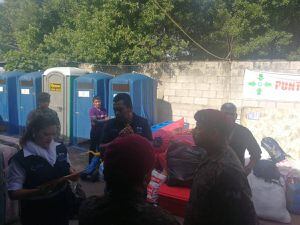 Sobrevivientes de la erupción son trasladados a casas temporales en Alotenango